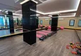 Kupić 1+1 mieszkanie 70 m² w centrum Mahmutlar — umeblowane, przeszklony balkon, raty do 1 roku 14