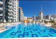 Kupić 1+1 mieszkanie 70 m² w centrum Mahmutlar — umeblowane, przeszklony balkon, raty do 1 roku 4