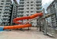 Kupić 1+1 mieszkanie 70 m² w centrum Mahmutlar — umeblowane, przeszklony balkon, raty do 1 roku 6