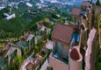Kupić 4+1 willa na terenie kompleksu hotelowego w Mahmutlar — meble, ogród, widok panoramiczny 11