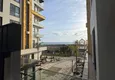 Dostępny zakup Apartament 1+1 w pierwszej linii w Mahmutlar — umeblowany i z widokiem na morze w pięciogwiazdkowym kompleksie hotelowym 10 