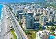 Kupić Apartament 1+1 w pierwszej linii w Mahmutlar — umeblowany i z widokiem na morze w pięciogwiazdkowym kompleksie hotelowym 1 