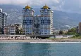 Kupić Apartament 1+1 w pierwszej linii w Mahmutlar — umeblowany i z widokiem na morze w pięciogwiazdkowym kompleksie hotelowym 4 