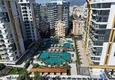 Kupić Apartament 1+1 w pierwszej linii w Mahmutlar — umeblowany i z widokiem na morze w pięciogwiazdkowym kompleksie hotelowym 5 