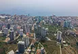 Kupić Wykończony apartament z dwiema sypialniami w kompleksie w budowie w Mahmutlar 1