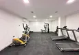 Kupić Wykończony apartament z dwiema sypialniami w kompleksie w budowie w Mahmutlar 12