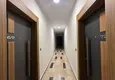 Kupić Wykończony apartament z dwiema sypialniami w kompleksie w budowie w Mahmutlar 16