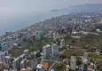 Kupić Wykończony apartament z dwiema sypialniami w kompleksie w budowie w Mahmutlar 2