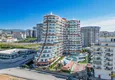 Kupić Apartament 1+1 w centrum Mahmutlar - na 12. piętrze z meblami i widokiem na góry 1