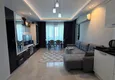 Dostępny zakup Apartament 1+1 w centrum Mahmutlar - na 12. piętrze z meblami i widokiem na góry 1