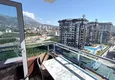 Dostępny zakup Apartament 1+1 w centrum Mahmutlar - na 12. piętrze z meblami i widokiem na góry 13