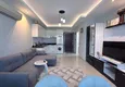 Dostępny zakup Apartament 1+1 w centrum Mahmutlar - na 12. piętrze z meblami i widokiem na góry 2