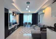 Dostępny zakup Apartament 1+1 w centrum Mahmutlar - na 12. piętrze z meblami i widokiem na góry 4