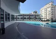 Kupić Apartament 1+1 w centrum Mahmutlar - na 12. piętrze z meblami i widokiem na góry 7