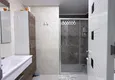 Dostępny zakup Apartament 1+1 w centrum Mahmutlar - na 12. piętrze z meblami i widokiem na góry 8