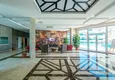 Kupić Apartament 1+1 w centrum Mahmutlar - na 12. piętrze z meblami i widokiem na góry 9