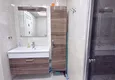Dostępny zakup Apartament 1+1 w centrum Mahmutlar - na 12. piętrze z meblami i widokiem na góry 9