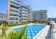 Kupić Apartament 1+1 70 m2 w Kestel — umeblowany, przeszklony balkon, 100 metrów od morza 1