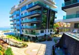 Kupić Dwupoziomowy penthouse 3+1 w Kargicak - pierwsza linia, prywatna plaża, raty 15-miesięczne 24