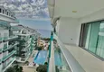 Dostępny zakup Dwupoziomowy penthouse 3+1 w Kargicak - pierwsza linia, prywatna plaża, raty 15-miesięczne 24