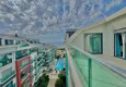 Dostępny zakup Dwupoziomowy penthouse 3+1 w Kargicak - pierwsza linia, prywatna plaża, raty 15-miesięczne 30