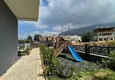 Kupić Duplex 2+1 w Mahmutlar — panoramiczne widoki, rezydencje w segmencie komfortu 5
