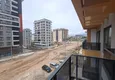 Dostępny zakup 1+1 mieszkanie w centrum Mahmutlar - przystępna cena, nowy budynek 12