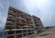 Kupić 1+1 mieszkanie w centrum Mahmutlar - przystępna cena, nowy budynek 2