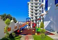 Kupić Gorąca oferta: 1+1 apartament w Mahmutlar - strona południowa, centrum dzielnicy 10