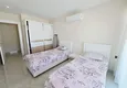 Dostępny zakup Apartament 2+1 w Mahmutlar — meble, widok na góry, pierwsza linia brzegowa 12