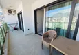 Dostępny zakup Apartament 2+1 w Mahmutlar — meble, widok na góry, pierwsza linia brzegowa 15