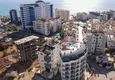 Kupić Apartament i penthouse w Tosmur - pojedyncza cena za dwie nieruchomości, 300 m od morza 1