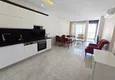 Dostępny zakup Apartament 2+1 w Mahmutlar — meble, widok na góry, pierwsza linia brzegowa 3