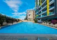Kupić Apartament 2+1 w Mahmutlar — meble, widok na góry, pierwsza linia brzegowa 5