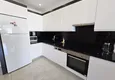 Dostępny zakup Apartament 2+1 w Mahmutlar — meble, widok na góry, pierwsza linia brzegowa 4