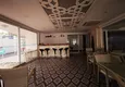 Kupić 2+1 mieszkanie 140 m2 w Mahmutlar — meble, przeszklony balkon, kompleks premium 18