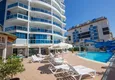 Kupić 2+1 mieszkanie 140 m2 w Mahmutlar — meble, przeszklony balkon, kompleks premium 3