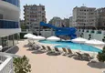 Kupić 2+1 mieszkanie 140 m2 w Mahmutlar — meble, przeszklony balkon, kompleks premium 6