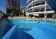 Kupić 2+1 mieszkanie 140 m2 w Mahmutlar — meble, przeszklony balkon, kompleks premium 8