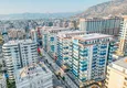 Kupić 1+1 panoramiczny apartament w centrum Mahmutlar - luksusowe meble, morze w odległości spaceru 5 
