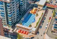 Kupić 1+1 panoramiczny apartament w centrum Mahmutlar - luksusowe meble, morze w odległości spaceru 6 