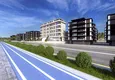 Kupić Nieruchomości premium w Alanyi od dewelopera - nowy projekt na plaży w Oba 4