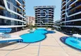 Kupić 1+1 umeblowane mieszkanie w Alanya, dzielnica Tosmur - kompleks premium, 245 metrów od morza 1