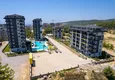 Kupić Nieruchomość w Alanyi z ratami do 1 roku - nowy apartament 1+1 z widokiem na morze w Avsallar 5 