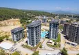 Kupić Nieruchomość w Alanyi z ratami do 1 roku - nowy apartament 1+1 z widokiem na morze w Avsallar 7 