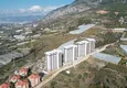 Kupić Nieruchomość w Alanyi z widokiem na morze - apartament 1+1 w Mahmutlar 1 