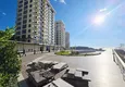 Kupić Nieruchomość w Alanyi z widokiem na morze - apartament 1+1 w Mahmutlar 5 