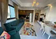 Dostępny zakup Apartament 1+1 w Alanya, dzielnica Mahmutlar — meble, widok na góry 10