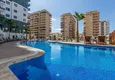 Kupić Apartament 1+1 w Alanya, dzielnica Mahmutlar — meble, widok na góry 18