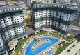 Kupić Apartament 1+1 w Alanya, dzielnica Mahmutlar — meble, widok na góry 3